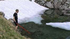 Olly seems very interested in this floating iceberg by the side of the mountain road, 9.9 miles into the ride